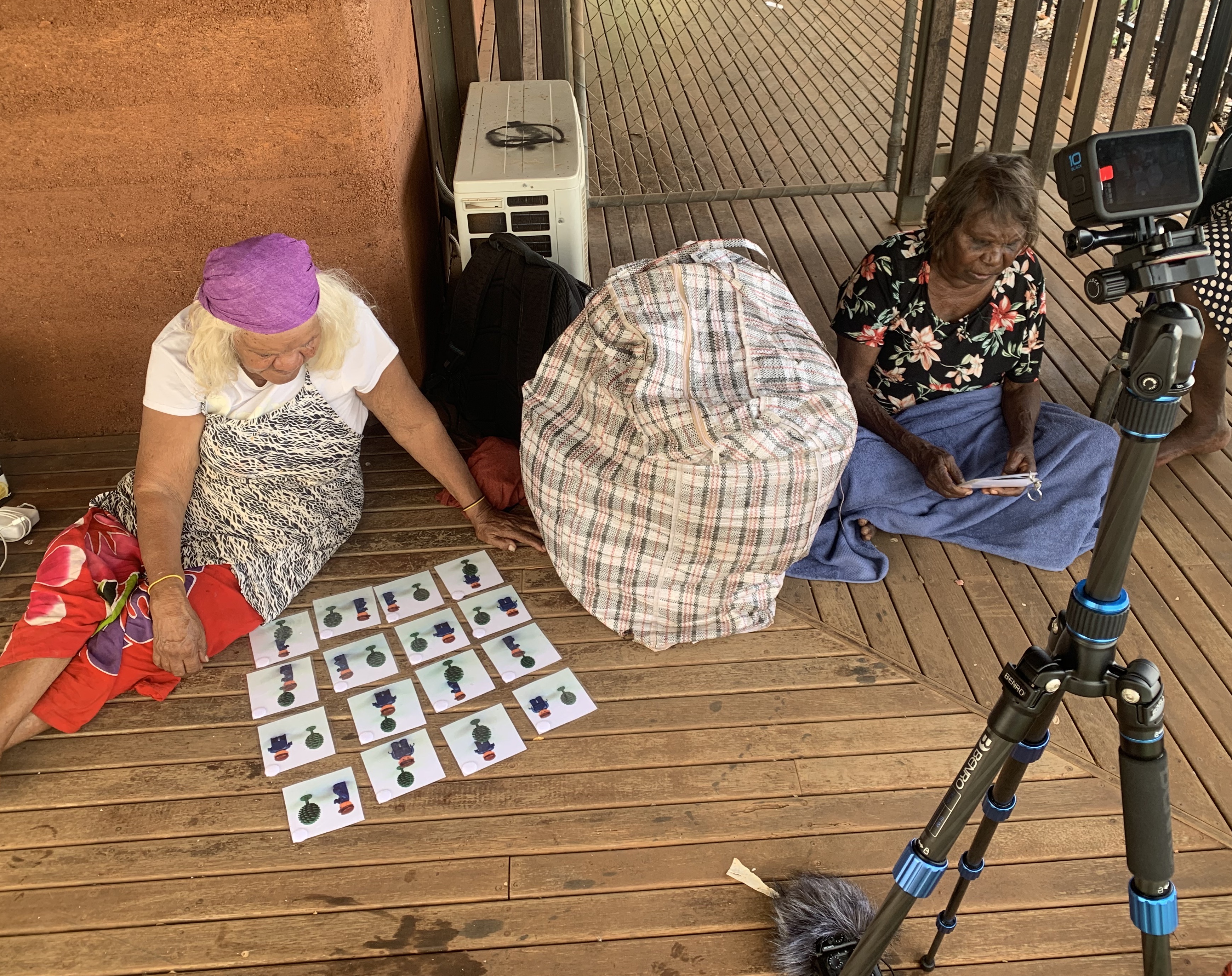 Marie Mudgedell (left) and Helen Nagomara (right) play the Man and Tree Game